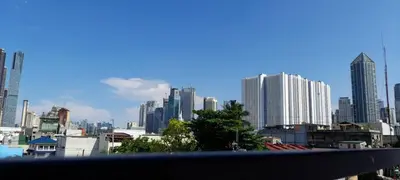 a view of a city skyline with tall buildings at Masterpiece Staycation Makati in Manila