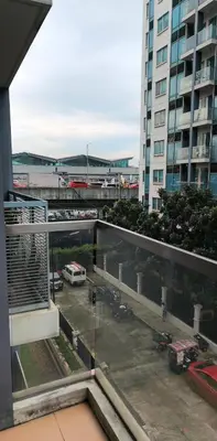 a view of a parking lot from a building at Palm Tree Villas - Studio Unit in Manila
