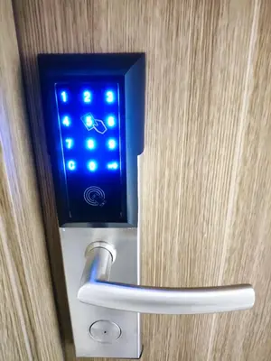 a blue light on a door with a handle at Shore 2 Residences T1, MoA WTC SMX Arena 1br 4pax in Manila