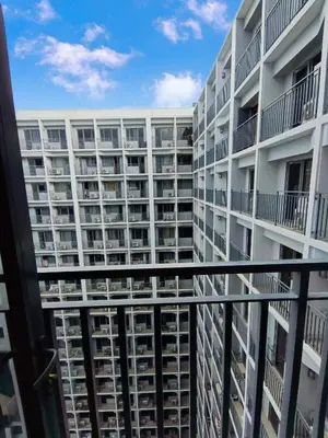a view of an apartment building from a balcony at Shore 2 Residences T1, MoA WTC SMX Arena 1br 4pax in Manila