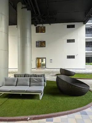 a living room with a couch and a large building at Shore 2 Residences T1, MoA WTC SMX Arena 1br 4pax in Manila