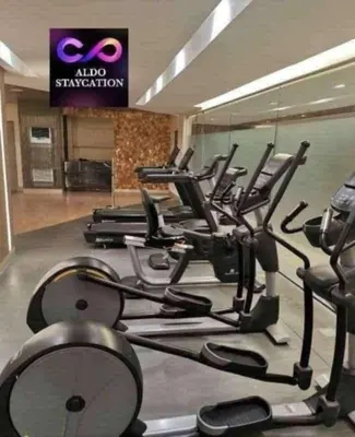 a gym with a bunch of cardio machines at Shore 3 in Manila