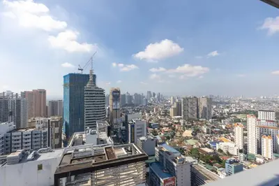 a view of a city from the top of a building at Bohemian 1-BR Condo in Mandaluyong in Manila