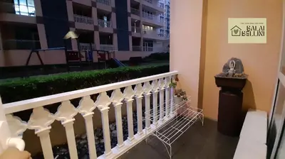 a balcony of a building with a stair railing at Condo in McKinley Hill near Grand Canal Mall (Balai Bellini) in Manila