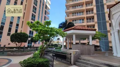a gazebo in front of a building at Condo in McKinley Hill near Grand Canal Mall (Balai Bellini) in Manila