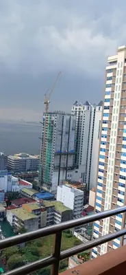 a view of a city with tall buildings at Birch Tower by The Bay in Manila
