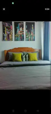 a bed with two teddy bears sitting on top of it at Sweet Kathleen at The Beacon Makati in Manila