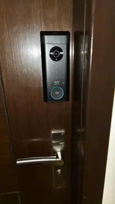 a door with a lock on a wooden door at 1 BR Uptown BGC Cozy Condo Netflix 200Mb Wi-Fi in Manila