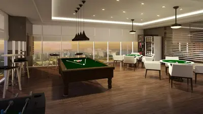 a room with a pool table and some tables and chairs at SMDC Coast Residences - The Happy Place in Manila