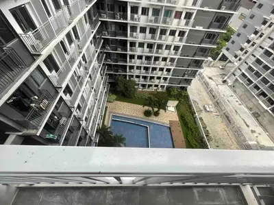 an overhead view of a large apartment building with a pool at Mall of Asia Shore 3 near Airport Pasay Manila 1 Bedroom Wifi in Manila