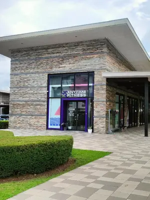 a store front of a brick building at Condo in Silang near Nuvali - Dy's Haven Suites in Silang