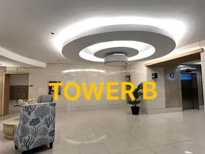 a lobby with the word towerb on the ceiling at Aiza's Place in Shell Residences MOA in Manila