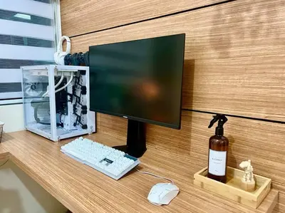 a computer monitor and a keyboard and mouse on a desk at PSV NAIA T3 - Month of January - New Year 2026 PROMO Php 1,999 - 1 BR Interior Designed Unit in Manila