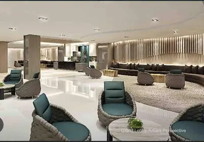 a hotel lobby with chairs and a waiting area at POSH 1 BR Unit+ Netflix*WIFI @ Shore 2 in Manila