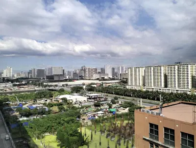 a view of a city with a park and buildings at POSH 1 BR Unit+ Netflix*WIFI @ Shore 2 in Manila