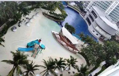 a model of a water park in a resort at Azure Condo 1BR Next to Mall, Near City & Airport in Manila