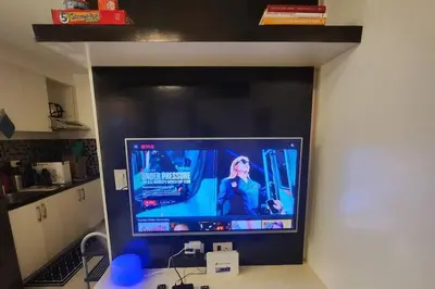 a flat screen tv sitting on a wall at Great View in Makati in Manila
