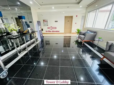 a lobby with a waiting room with a no smoking sign at Amiela’s Place in Trece Martires