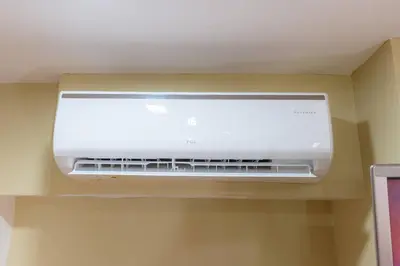 a air conditioner on a ceiling in a room at A2J BGC Luxury 2BR Loft Near High Street, Airport in Manila