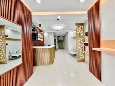 a hallway with a bar in a store at OYO 1045 Rayjan Apartelle in Manila