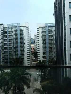 a view of apartment buildings from a window at RG condotel Near Naia Terminal 3 in Manila