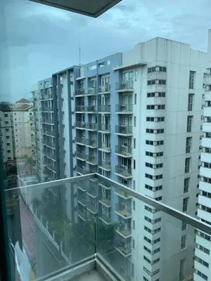 a view from the balcony of a apartment building at RAMCONDOTEL in Manila