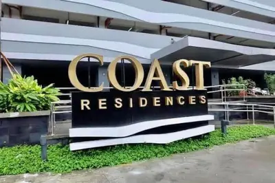 a sign in front of a building at Manila Bay Retreat at Soleil Suite in Manila