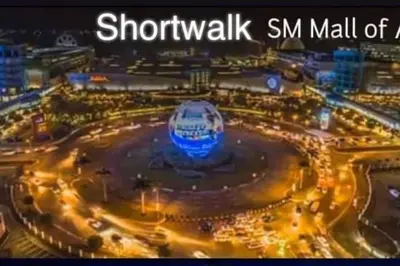 a view of a mall at night at Shore Residence D21 shortwalk MOA Balconypoolview in Manila
