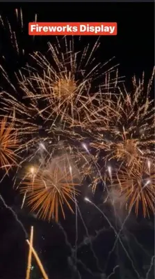 a fire works display with fireworks in the sky at SHELL RESIDENCE C23 Shortwalk MOA Balcony poolview in Manila