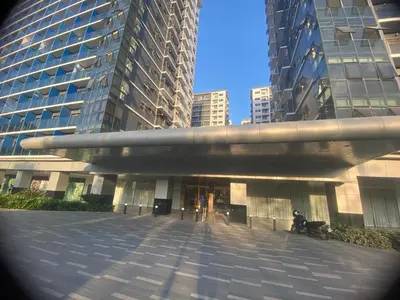 a building in a city with tall buildings at Ella’s Condo@Shore3 T3 in Manila