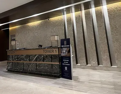 a counter in a building with a ticket booth at New Luxury Condo in Mall of Asia and near Manila Airport in Manila
