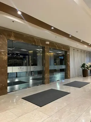 a lobby with two meditation mats in front of a building at New Luxury Condo in Mall of Asia and near Manila Airport in Manila