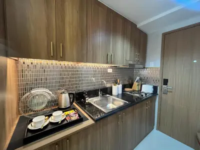a kitchen with a sink and a counter at New Luxury Condo in Mall of Asia and near Manila Airport in Manila