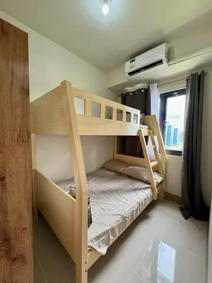 a bunk bed in a small room with a bunk bedutenewayangering at SHORE 3 RESIDENCES TOWER 2 in Manila