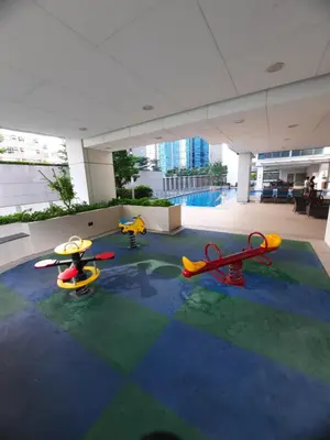 a room with childrens play equipment in a building at Bonifacio global city one uptown residence-2 Bedroom in Manila