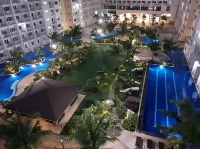 an overhead view of a pool in a building at Shore Residence D22 shortwalk MOA Balconypoolview in Manila