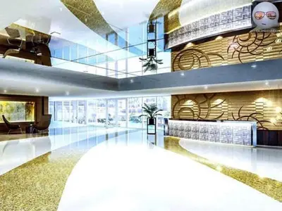 a lobby of a building with a large lobby at SHELL RESIDENCE C22 Shortwalk MOA Balcony poolview in Manila