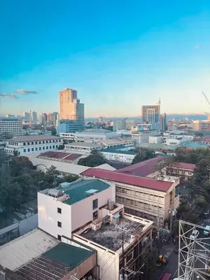 an aerial view of a city with buildings at Modern Condo near St Lukes and US Embassy in Ermita Manila in Manila