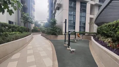 a building with a walkway with exercise equipment in it at 11C Tower 1 Viceroy Residences McKinley BGC in Manila