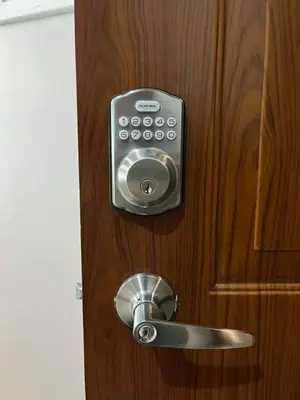 a door with a lock on a wooden door at The Beacon Condo (1BR Unit) in Manila