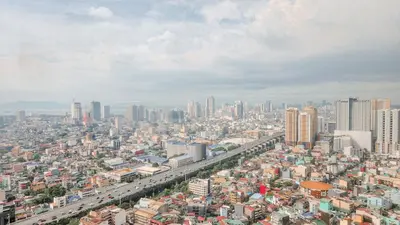 an aerial view of a large city with buildings at The Beacon Condo - Studio Tower 1 in Manila