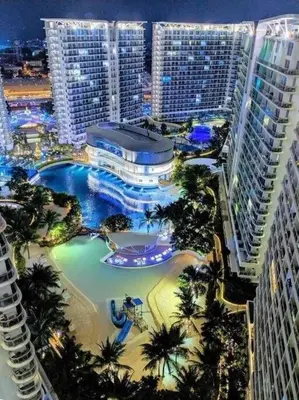 an aerial view of a resort with a water park at Azure Urban Resort a12 Wavepool near mall airport in Manila