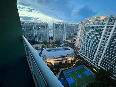 a view of a city from a balcony of a building at Azure Urban Resort a12 Wavepool near mall airport in Manila