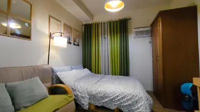 a small room with a bed and a couch at J Studio - Fast WiFi, 55