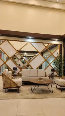 a living room with a couch and chairs and tables at J Studio - Fast WiFi, 55
