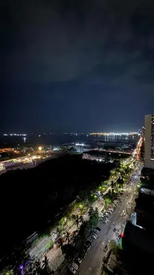 an overhead view of a city at night at 2 BR Condo SMDC Breeze Residences in Manila