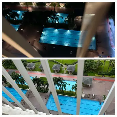 an overhead view of a swimming pool at a resort at SMDC Light Residences Condominium in Manila