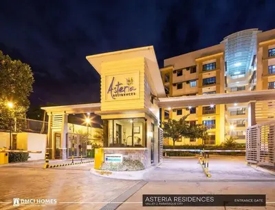 a building with a sign on the front of it at 3BR Resort Style Condo in Manila