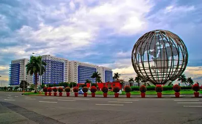 a large metal ball in front of a large building at 5 Years Legit Staycation Infront of Moa, 2 Bedroom with Balcony at Sea Residences Tower A, Near Arena , Smx, Picc, Dfa Macapagal, World Trade, Star City, Ayala Mall, & Naia Sea Residences Tower A in Manila