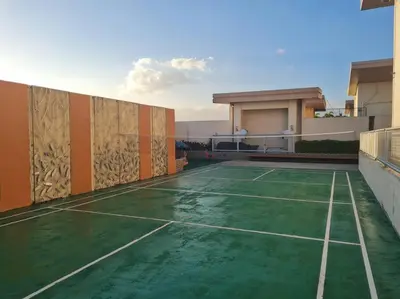 a tennis court in the middle of a house at Cute Studio Unit w/ Big Windows - B Morgan T1 in Manila
